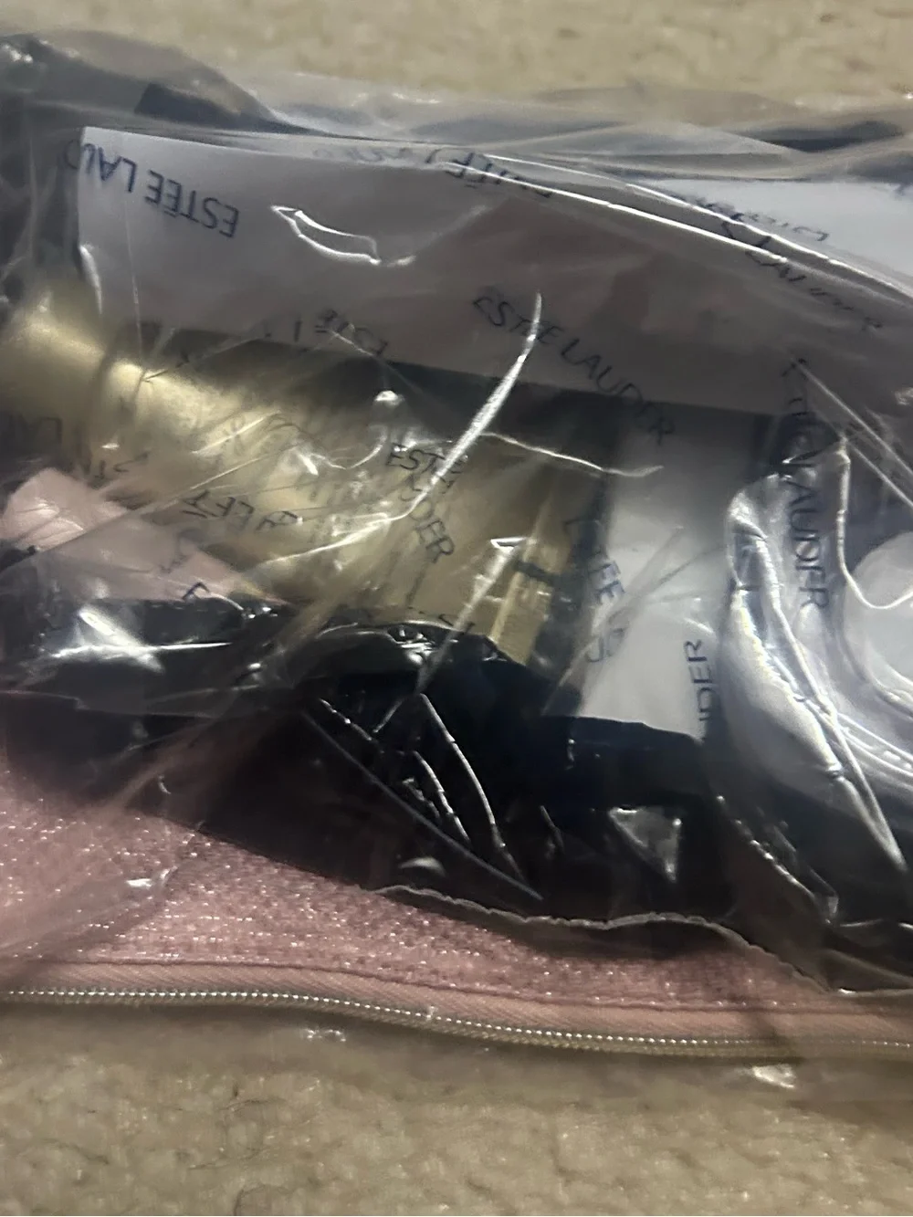 NWT ESTEE LAUDAR 5 piece gift set with pink shimmer cosmetics bag.
